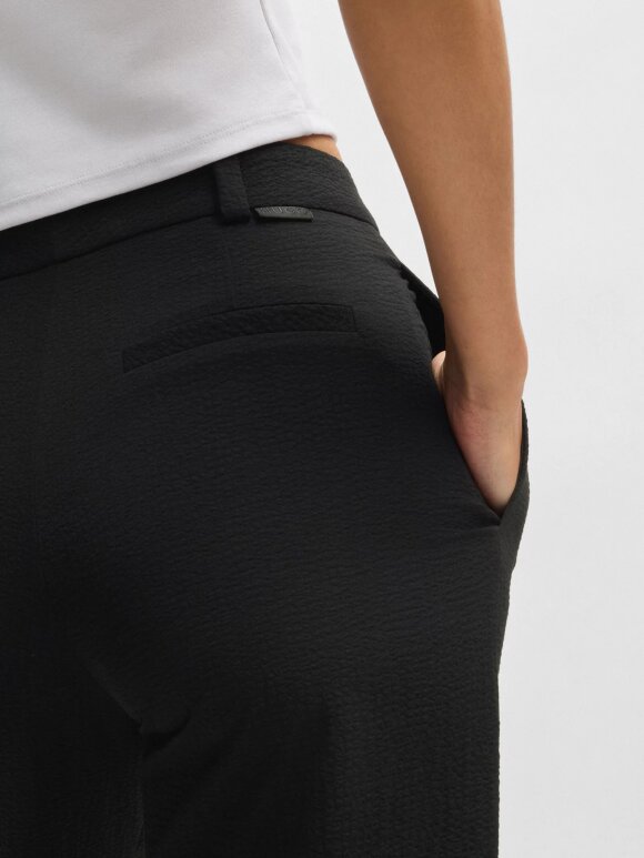 HUGO WOMENSWEAR - HUGO WOMENSWEAR HASENE REGULAR-FIT TROUSERS IN STRETCH SEERSUCKER
