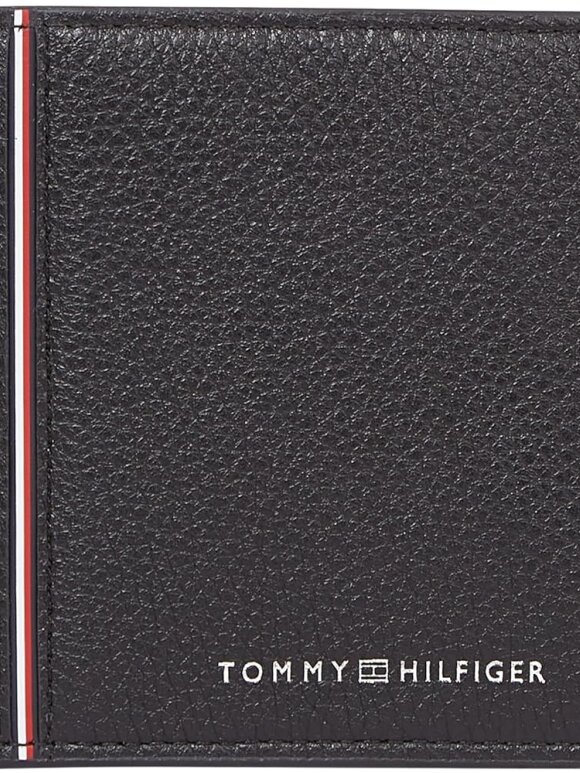 TOMMY CORP CC AND COIN